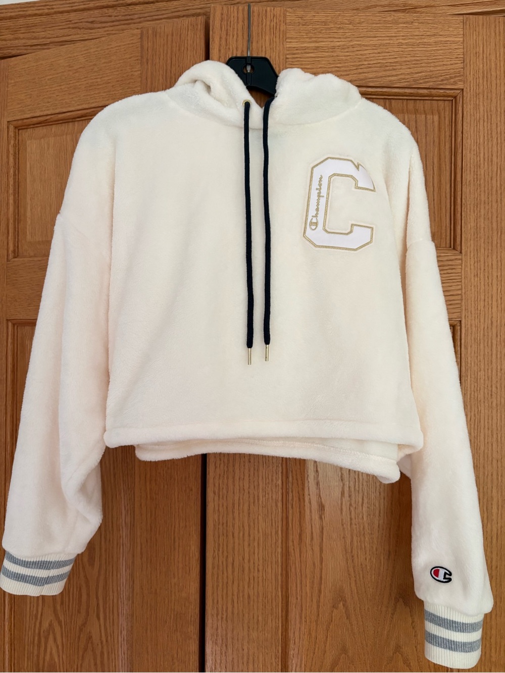 Champion Cream Hoodie with Black Accents